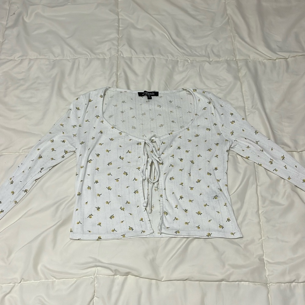 White overall top.